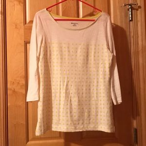 Cream colored long sleeve top